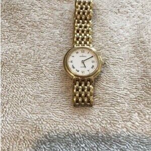Movado Sapphire Gold Mirror Diamond Dial Ladies